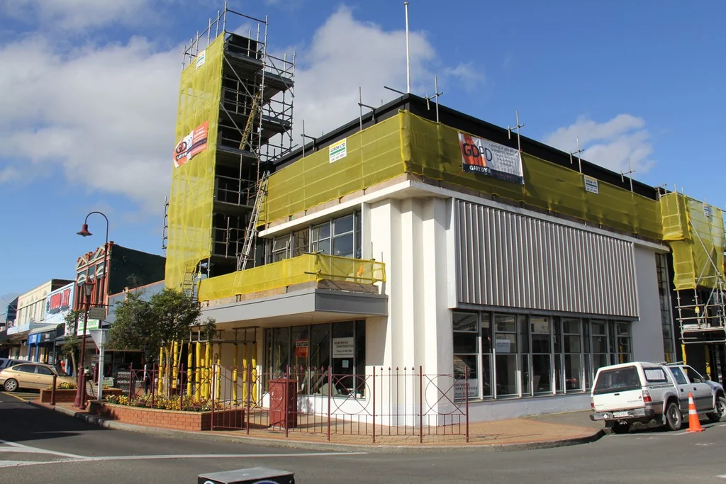 Commercial building exterior with scaffolding during work
