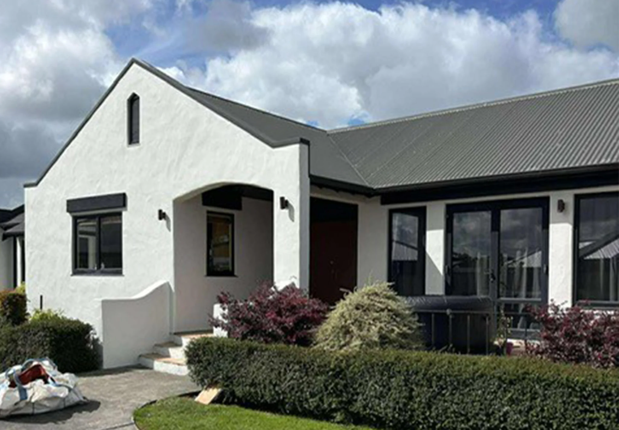 White home exterior following a residential repaint