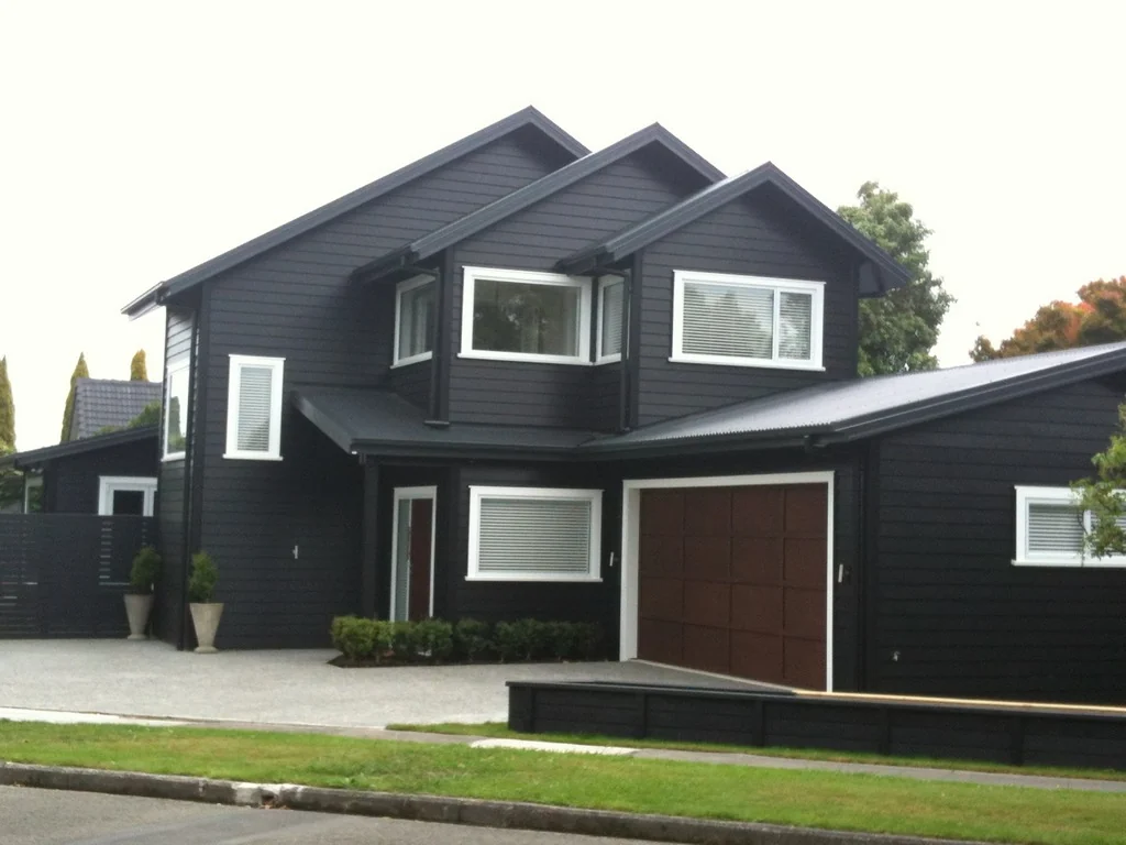 Dark painted two-storey home